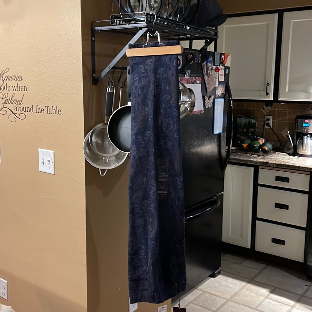 Misses pants blue denim with paisley print . Never worn tags still on.